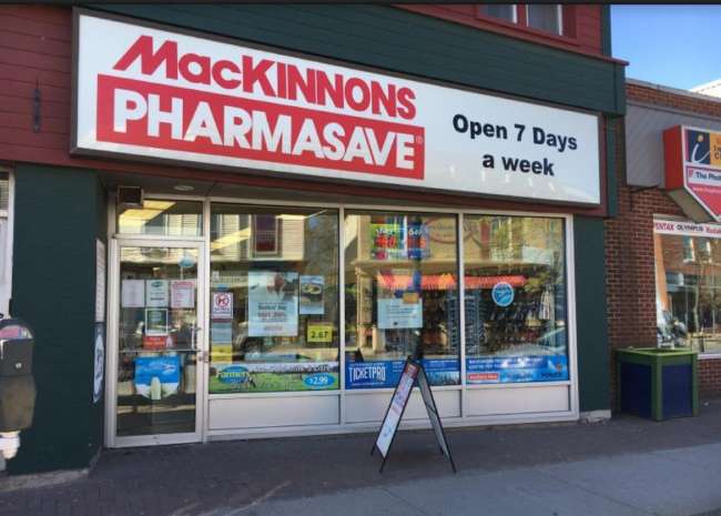 Small storefront with large exterior windows and Home Health Care & MacKinnon's Pharmasave signage out front