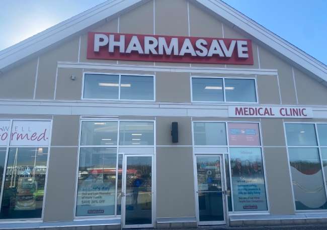 White building with Pharmasave and Medical Clinic signage out front